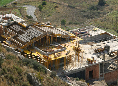 正在建造的建筑家园奢华工地积木房屋住宅建筑学构图框架房子背景图片