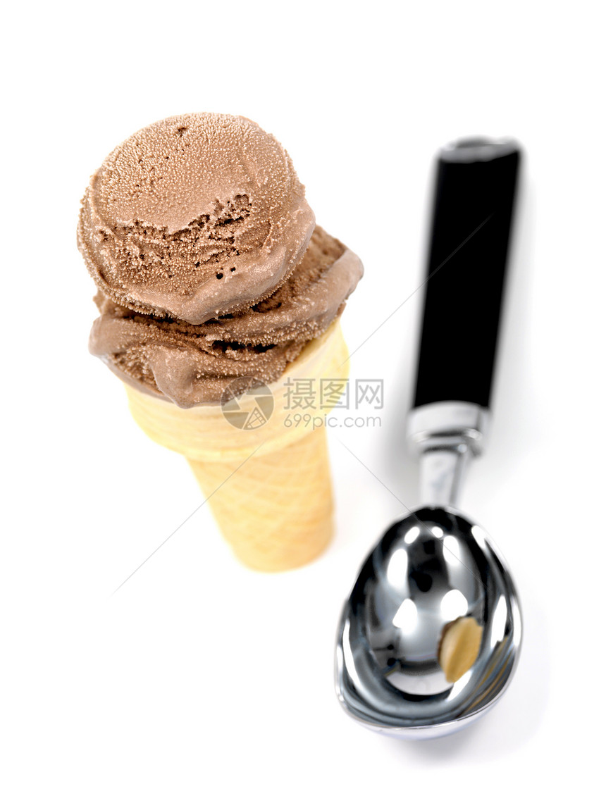 巧克力冰淇淋奶制品锥体胡扯小吃味道奶油状产品食物白色甜点图片