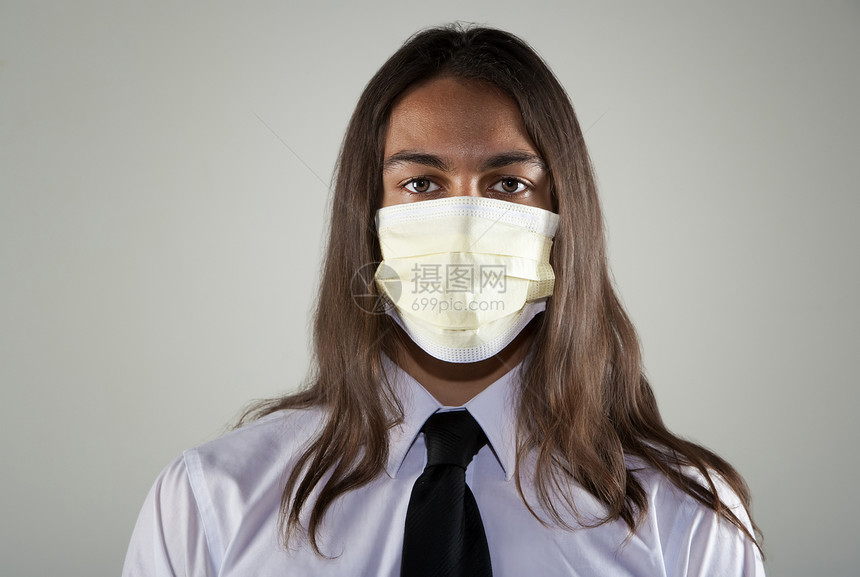 戴呼吸面具的人领带感染预防医疗面具呼吸流感男性成人头发图片