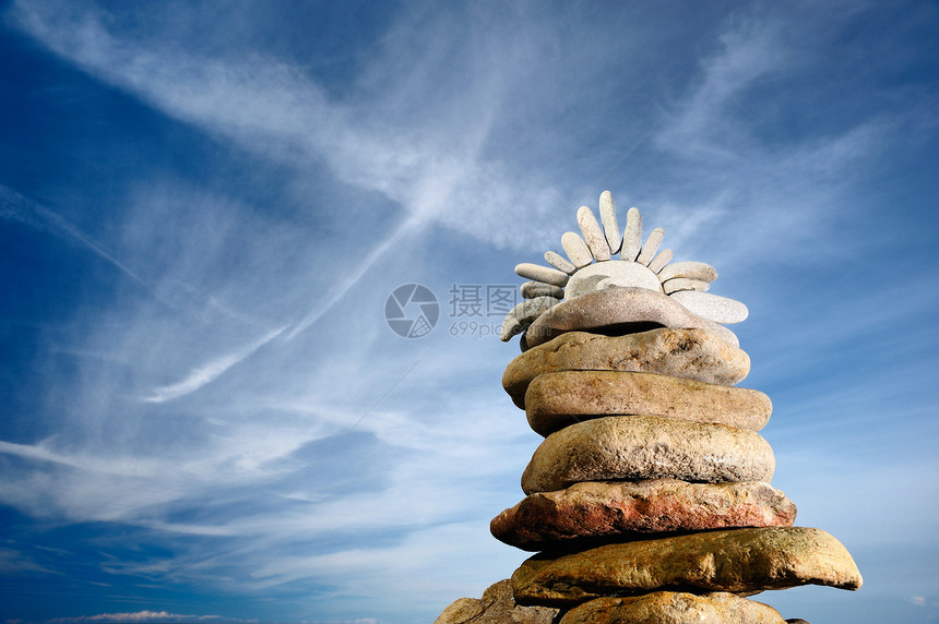 太阳符号灰色卵石海滩岩石石头图片