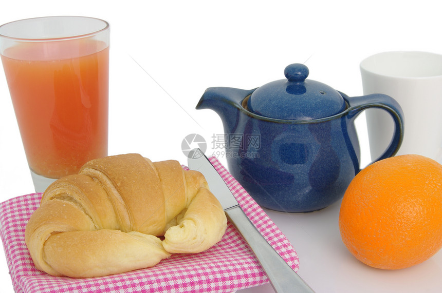 轻便早餐果汁羊角茶壶橙子营养面包茶碗玻璃食物白色图片