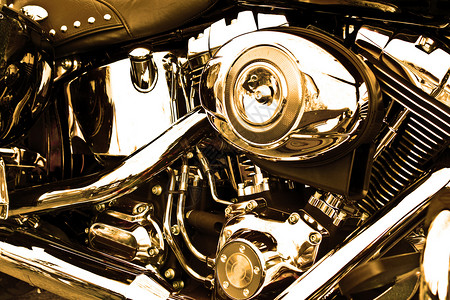 引擎细节机器合金反射自行车运输发动机棕褐色金属车辆速度背景图片