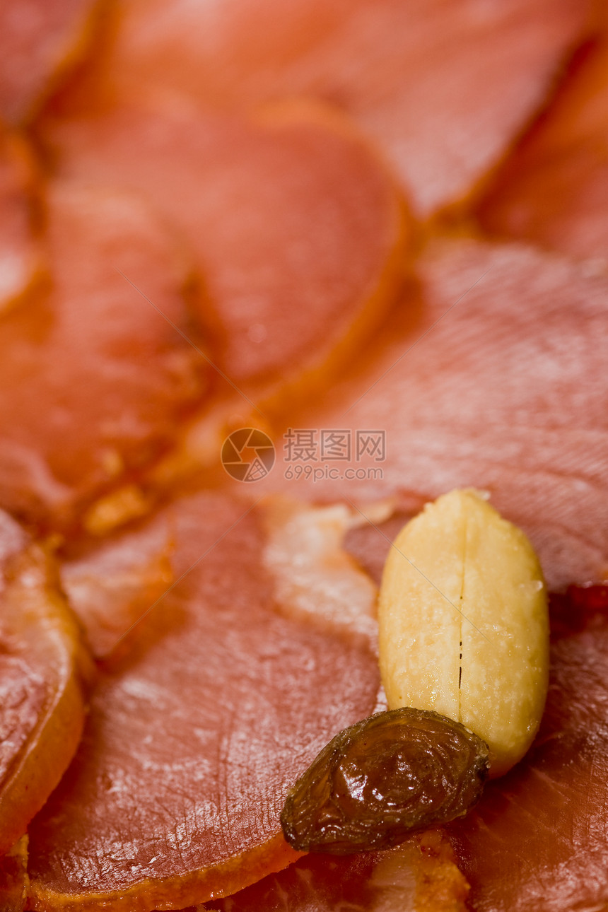 Iberian 猪肉肠花生腰部猪肉红色美食葡萄干食物营养图片