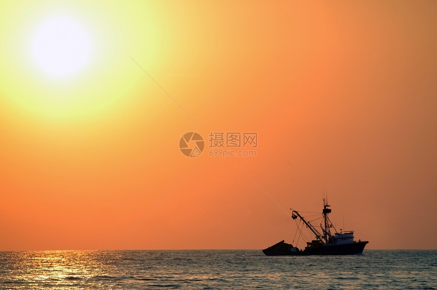 北埃斯康迪多港日落海面旅游橙子海岸季节旅行渔夫钓鱼地平线场景反射图片