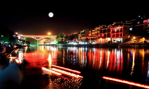 中国凤凰城夜幕风景城市月亮反射建筑吸引力村庄少数民族餐厅游客橙子背景