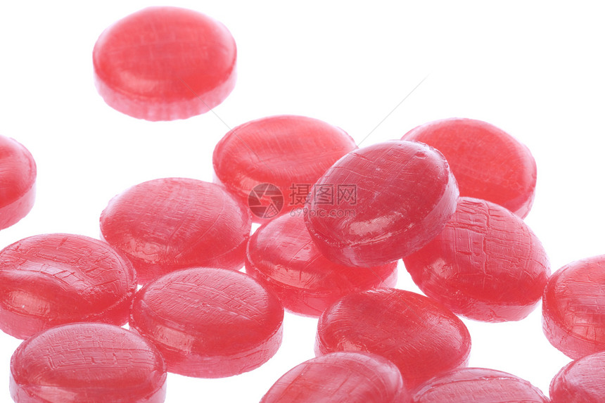 孤立的糖果红色粉色食物宏观刺激糖衣大枣图片