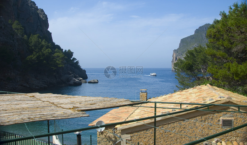 中转石岩石海洋热带房子旅行海岸线海岸图片