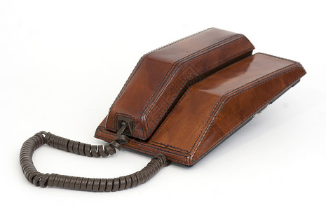 古老的等同型皮革电话背景图片