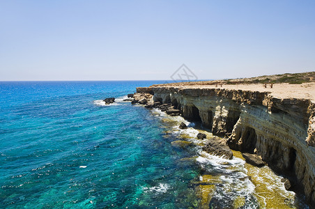 海洞花Agia Napa附近的塞浦路斯海洞穴旅行天蓝色旅游访问悬崖休息海洞假期蓝色背景