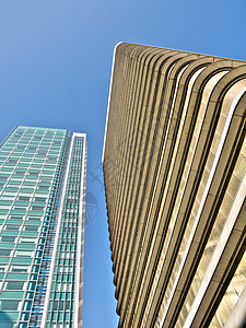 现代摩天大楼蓝色故事多层商业窗户企业办公室公司金子市中心背景图片