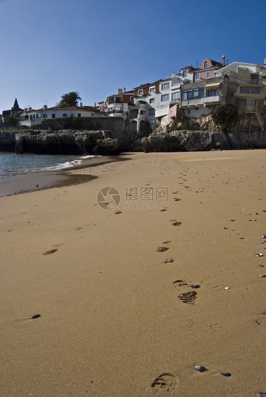 卡斯凯岛海滩太阳海浪树木堡垒手掌假期海滩支撑休息码头图片