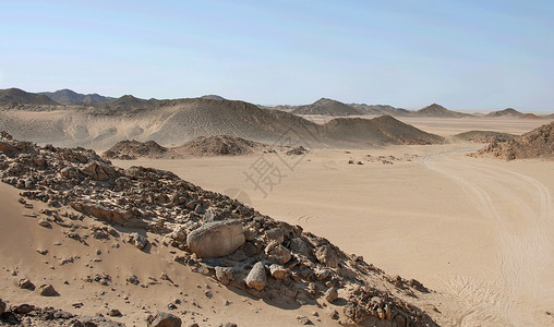 赫尔格达埃及沙漠海岸沙丘天空情调石头寂寞丘陵旅游海岸线干旱背景
