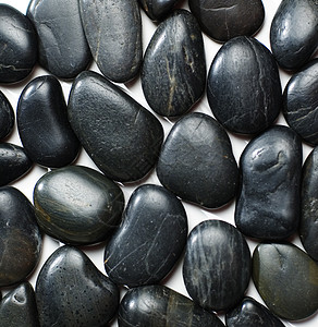 岩石群黑色石头展示团体宏观岩石背景图片