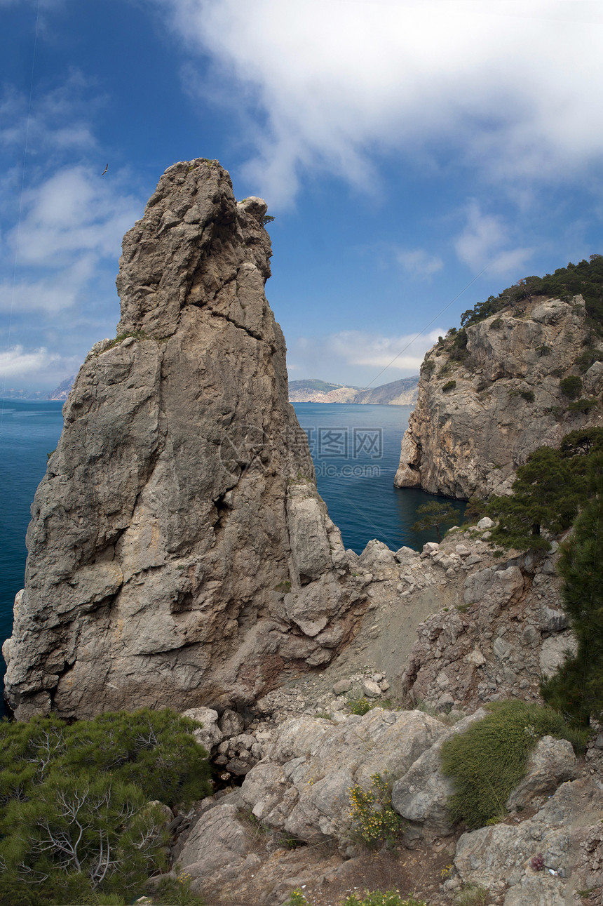 山与海岩石晴天旅行热带假期海岸线阳光海浪海洋风景图片