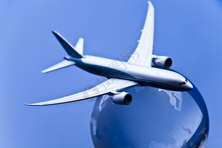 蓝色背景的地球航空班机旅行圆形运输飞机场乘客行星飞机外国护照插图背景图片