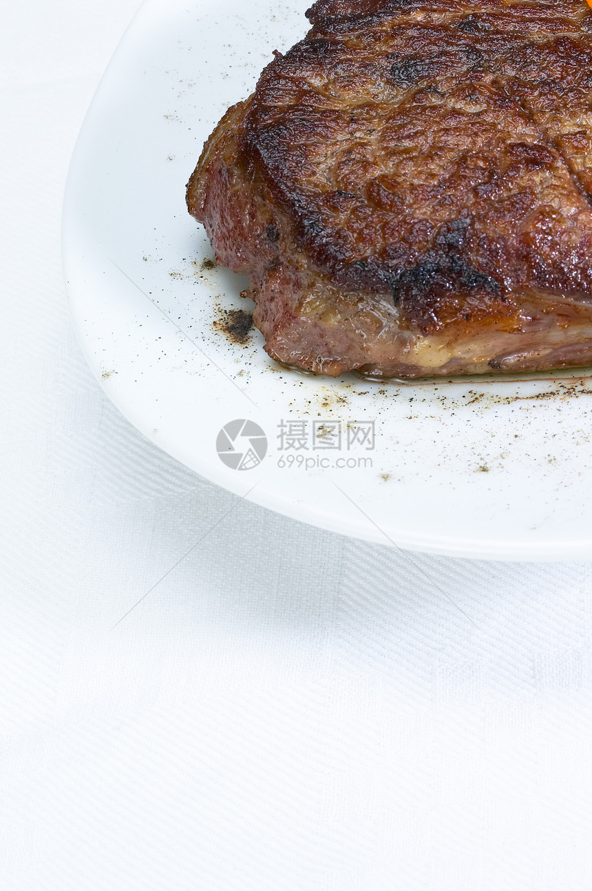 牛肉肋眼牛排炙烤牛肉胡椒牛扒盘子营养鱼片用餐工作室草本植物图片