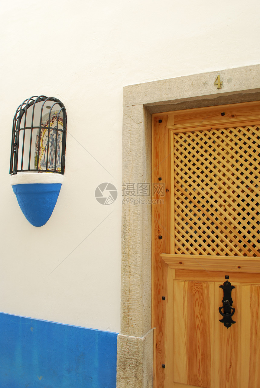 当地村典型的房屋细节房子建筑蓝色框架装饰入口住宅木头建筑学风格图片