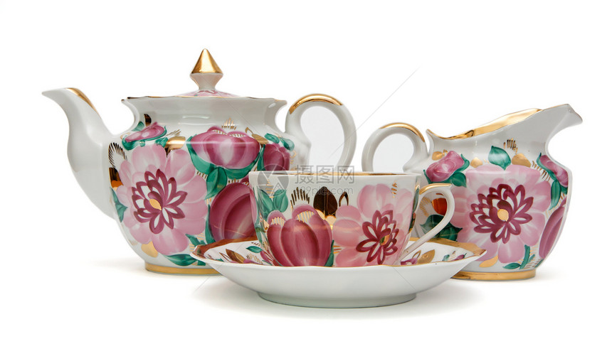 与植物型式隔离的老式茶茶服务金子红色杯子花朵茶壶水壶飞碟玫瑰白色盘子图片