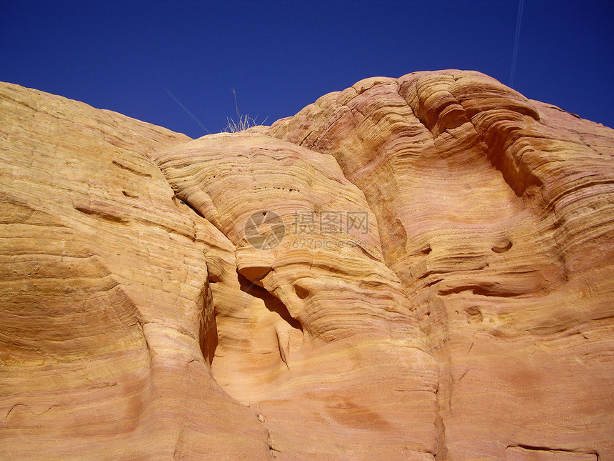 平滑的沙石悬崖图片