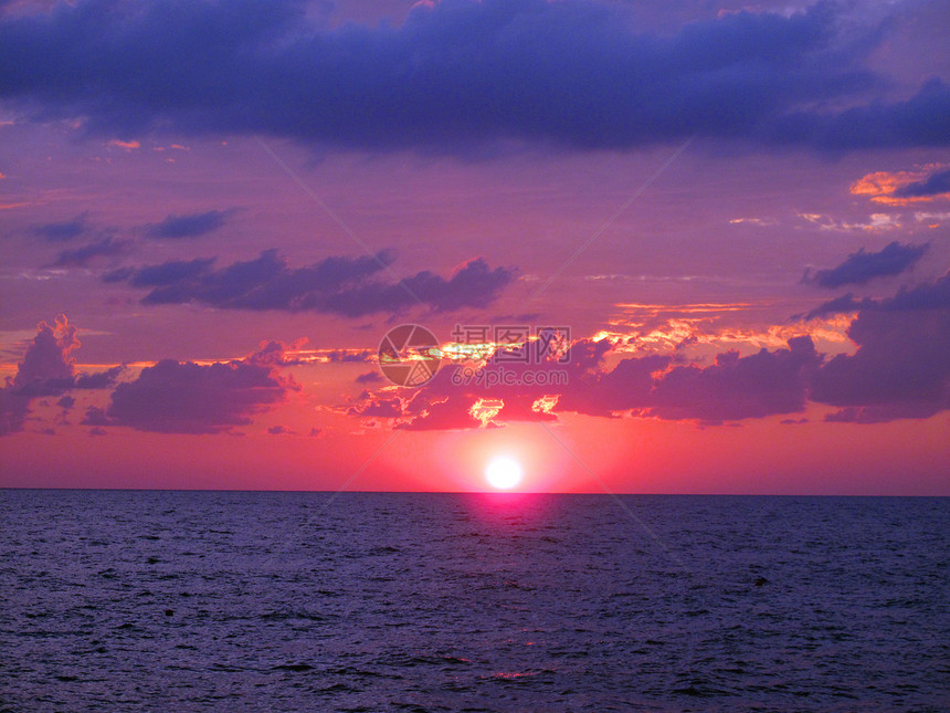 日落蓝色阳光太阳假期植物天气热带海洋天空海滩图片