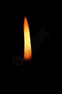 蜡烛火焰黄色黑色照明红色橙子背景图片