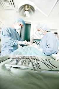 手术器械乐器操作医院男性剪刀医师工具女性兽医团队背景图片