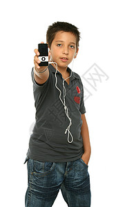 很酷的男孩听音乐 一个mp4播放器音乐数字孩子们技术耳塞音频男生耳机音乐播放器视频背景图片
