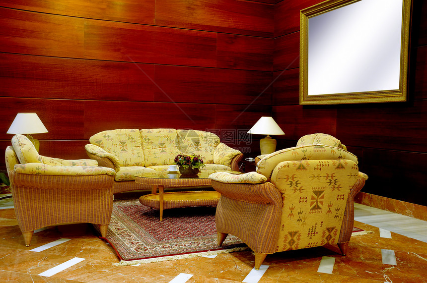 旅馆大厅大堂住宅公寓扶手椅沙发房间木头环境家庭椅子图片
