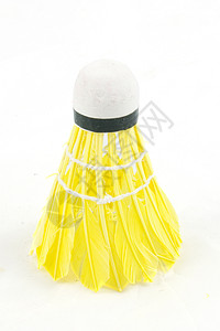 白色反黑格上孤立的彩色羽毛球运动属性游戏黄色毽子娱乐羽毛背景图片