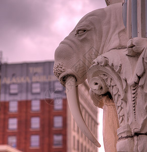 象体象牙雕塑城市獠牙海象石头背景图片