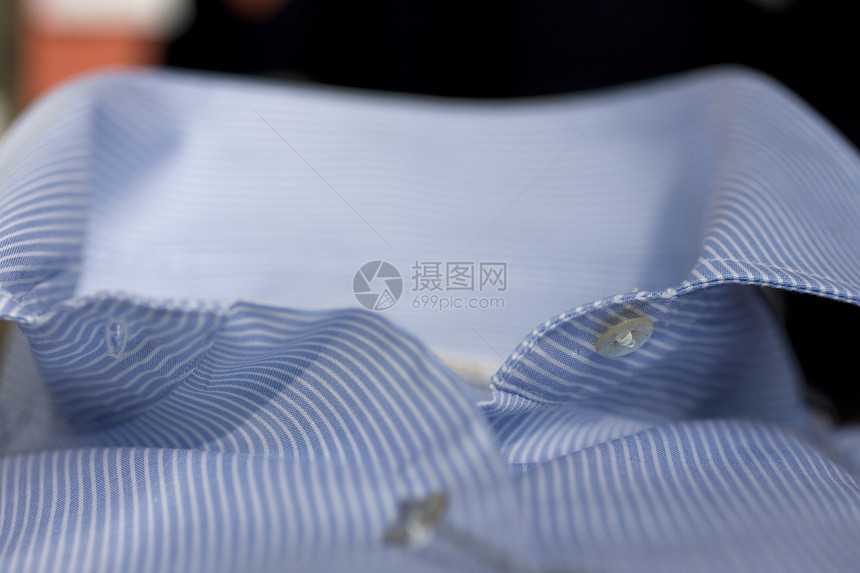 服装衬衫衣服零售商业正装蝴蝶蓝色按钮条纹庆典折叠图片
