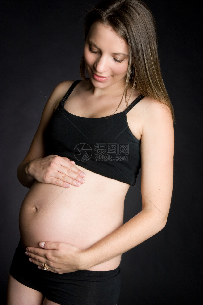 美丽的怀孕妇女喜悦母性婴儿黑色女孩妈妈女性快乐腹部女士图片