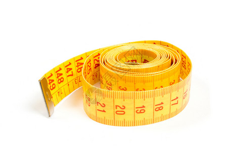 白色背景的卷曲黄色测量磁带缝纫力量裁缝腰部压力意志峡谷厘米饮食重量背景图片