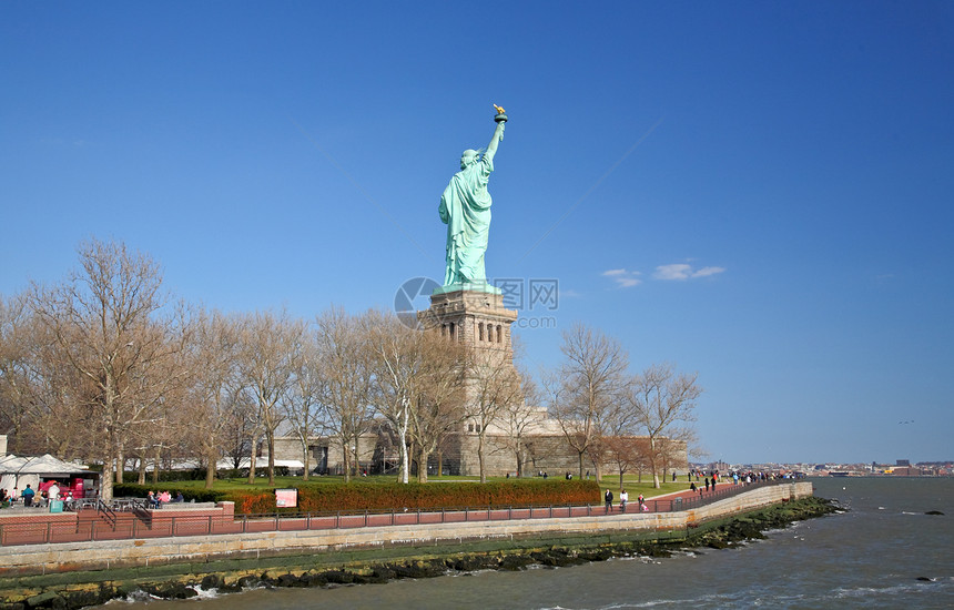 自由女神像纪念碑地标港口移民旗帜建筑学历史公园雕像蓝色图片