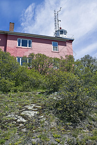 马奎特港灯塔地标半岛国家悬崖海岸线灯塔高清图片
