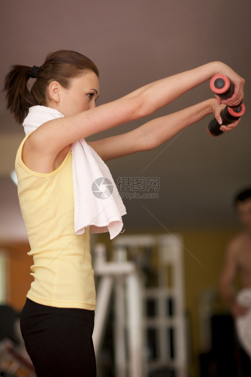 工作妇女杠铃女子女人肖像健康生活女士面孔举重的女人健身房运动图片