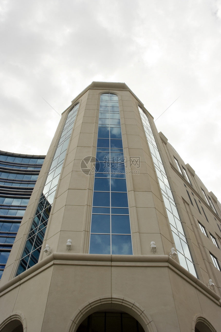 现代办公大楼办公室公司蓝色玻璃半圆釉面建筑学商业职场工作图片