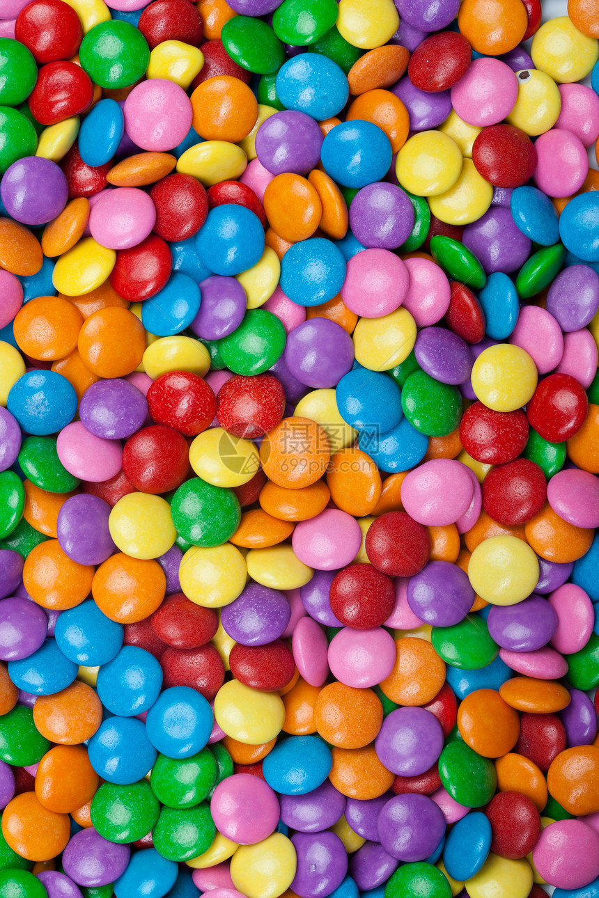 多彩多彩的巧克力糖果橙子绿色蓝色紫色黄色粉色图片