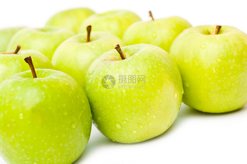 白色背景下的绿苹果Name果园生产水果小吃种子采摘市场飞沫生长食物图片