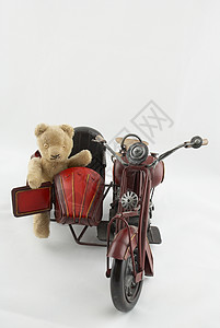 泰迪摩托车车遗产风俗车把边车孩子们玩具熊自行车玩具骑士轮子背景图片