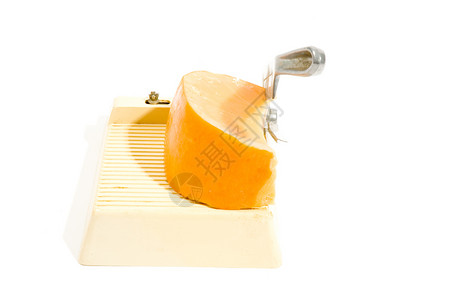 古老的时尚切乳酪切割机背景图片