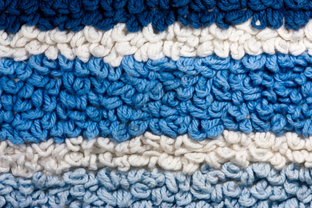 地毯纹理青色织物棉布白色蓝色宏观背景图片