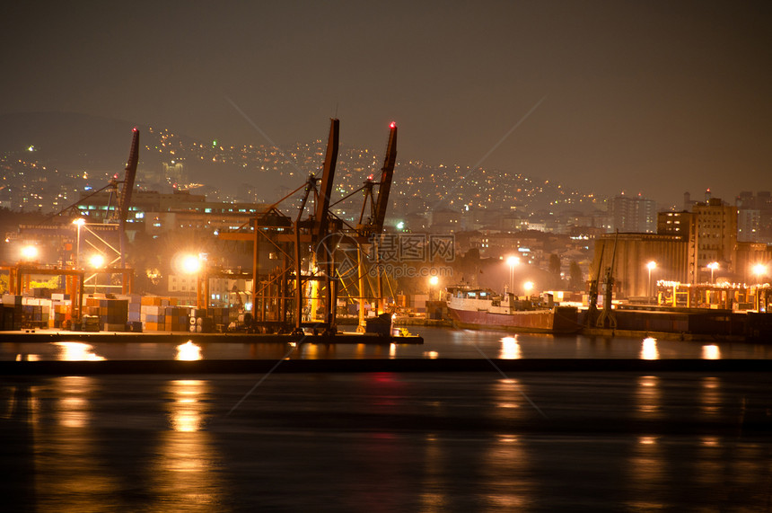 夜间集装箱港口进口载体血管货运加载卸载船运起重机货轮海洋图片