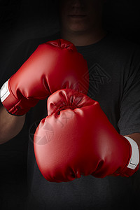 敲打飞行器拳头手套红色拳击斗争运动训练背景图片