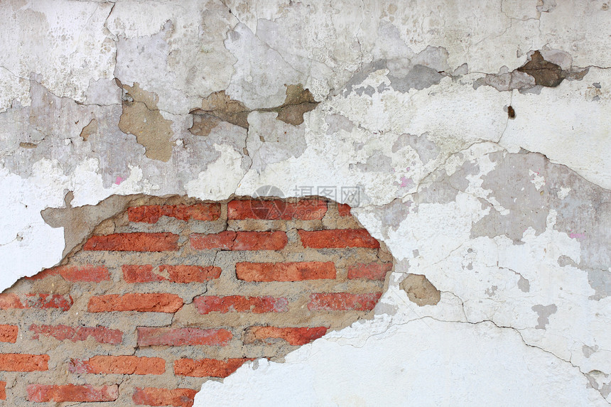 砖墙上的裂缝石头框架建筑学石工房子建筑材料风化古董水泥图片
