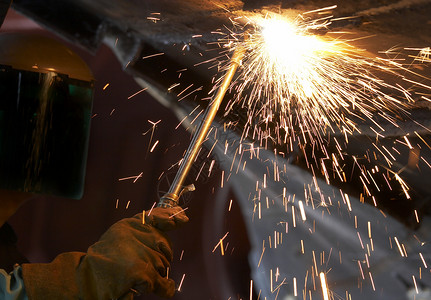 燃烧器金属职业工作火炬焊接男性制造业劳动焊机工业背景图片