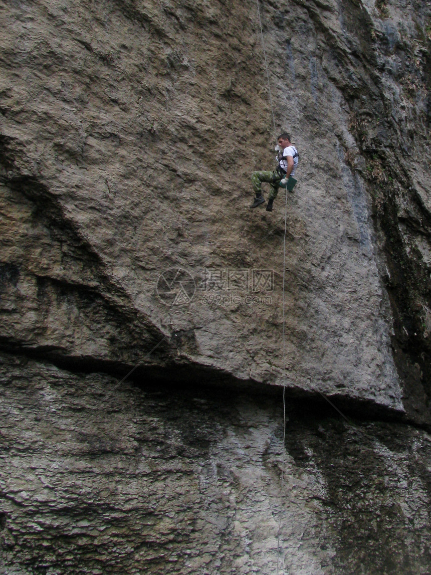 攀岩岩石极端山脉娱乐血统生活方式绳子风景乐趣登山图片