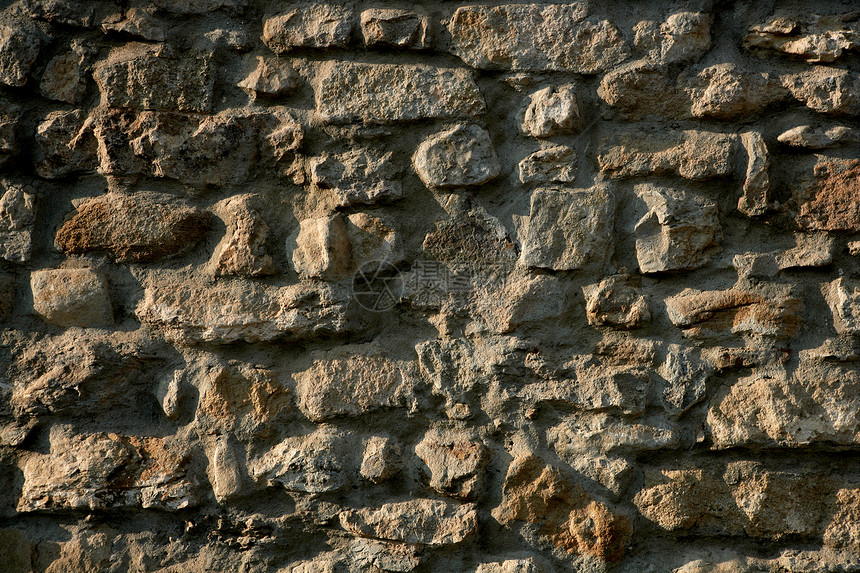 西班牙的共济会 旧石墙裂缝石工岩石石头砂浆墙纸水泥橙子材料古董图片