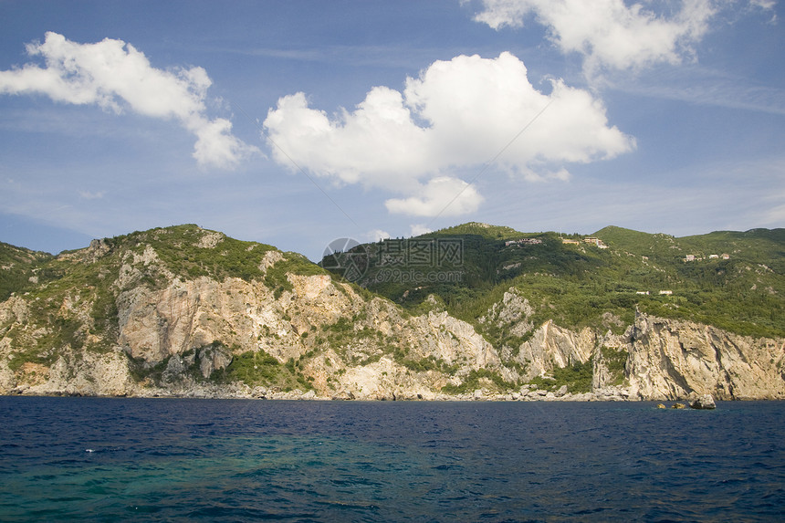 科孚希腊避暑胜地情调国家阳光支撑假期岩石旅游风景蓝色图片