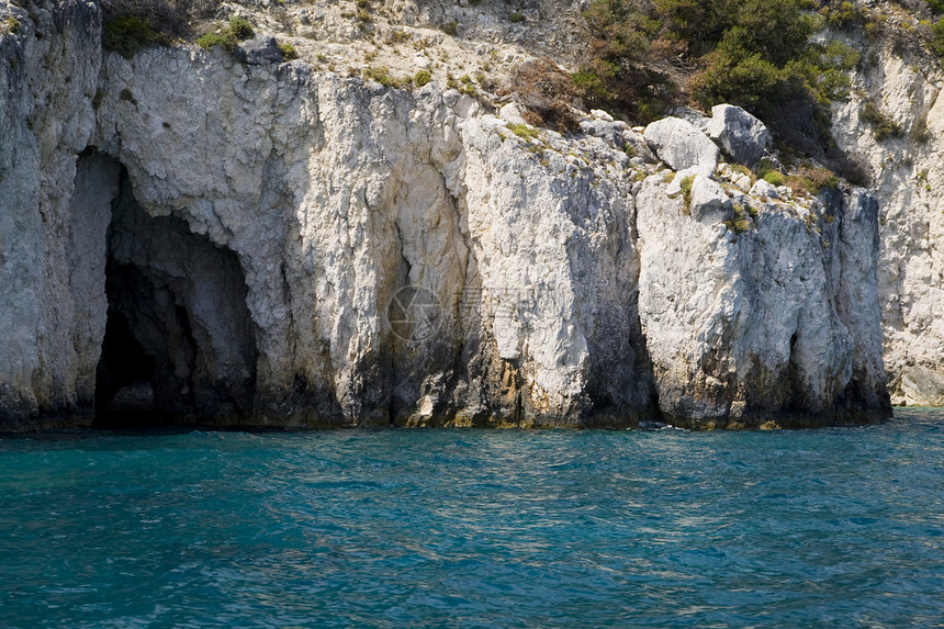 希腊国家目的地旅游避暑胜地蓝色绿色石灰石假期风景海岸线图片